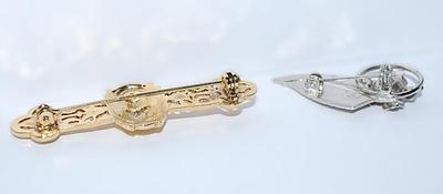 Collection of 2 BROOCHES - Gold Colored LION BAR (2" x¾") and Silver Colored Flower & Leaf (1¼" x 1")