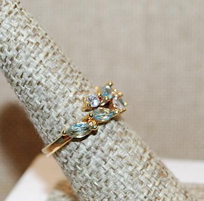 Size 7 ½ Staggered Carolina Blue Marquise Cut Stones & Round Clear Round Stone Accents on a Gold Tone Band (3.0g)