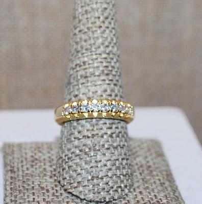 Size 9 Half Infinity Ring with Center Row of 8 Clear Stones on a "Grooved" Gold Tone Setting (5.3g)