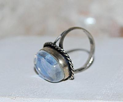 Size 7 Oval Transparent Light Blue OPAL Style Gemstone Ring with Sparkles on a Silver-Plated Band (5.1g)