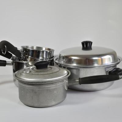 LOT 37K: Vintage Laurel Saucepan, Wear Ever Stock Pot, and Multiple Revere Ware Pots