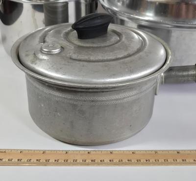 LOT 37K: Vintage Laurel Saucepan, Wear Ever Stock Pot, and Multiple Revere Ware Pots
