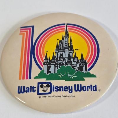 LOT 61K: Eyes and Ears 1986, 87, and 88 Copies, It's a Small World and Haunted House Albums, Mickey Mouse Figurine, and 2 Button Pins