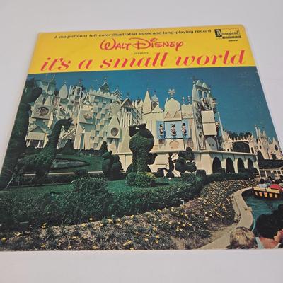 LOT 61K: Eyes and Ears 1986, 87, and 88 Copies, It's a Small World and Haunted House Albums, Mickey Mouse Figurine, and 2 Button Pins