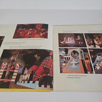 LOT 61K: Eyes and Ears 1986, 87, and 88 Copies, It's a Small World and Haunted House Albums, Mickey Mouse Figurine, and 2 Button Pins