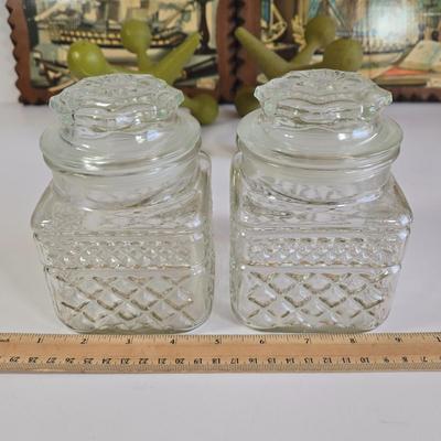 LOT 65L: 2 Charles Cerny Czech Artist 1960s Ship Art Print Wood Plaques, 2 Cast Iron Bookend/Doorsteop Jacks, and 2 Anchor Hocking Glass...