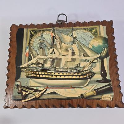 LOT 65L: 2 Charles Cerny Czech Artist 1960s Ship Art Print Wood Plaques, 2 Cast Iron Bookend/Doorsteop Jacks, and 2 Anchor Hocking Glass...