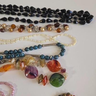 LOT 68K: Multiple Beaded Necklaces and 2 Bracelets