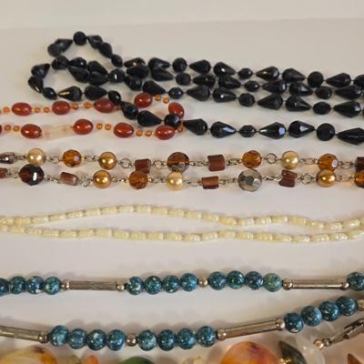 LOT 68K: Multiple Beaded Necklaces and 2 Bracelets
