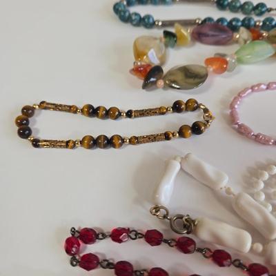 LOT 68K: Multiple Beaded Necklaces and 2 Bracelets