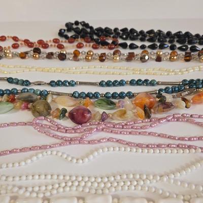 LOT 68K: Multiple Beaded Necklaces and 2 Bracelets