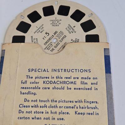 LOT 71L: Tasco International 7x50 Binoculars, Viewmaster, Reels, and Vintage Color Slides