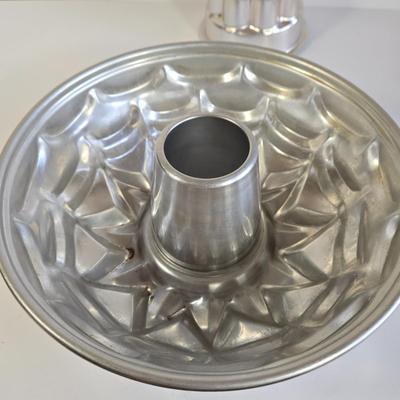 LOT 73K: Jello Molds, Cast Iron Trivet, Progressive Mortar & Pestle Set, Vintage Rosette Irons, and More