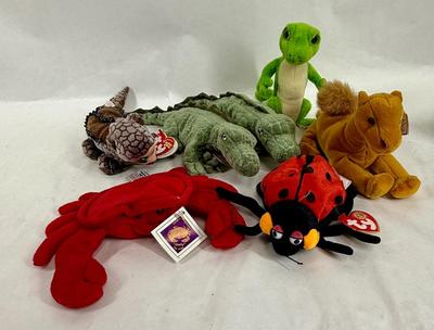 Sale Photo Thumbnail #316: 7 plush toys in good previously owned condition.