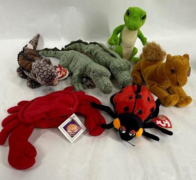 Sale Photo Thumbnail #318: 7 plush toys in good previously owned condition.