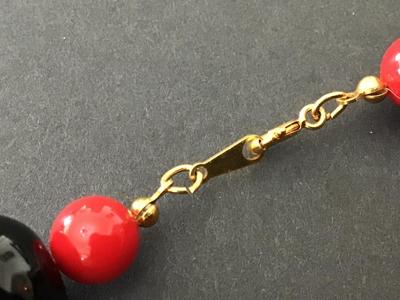 Beautiful Vintage Red Black Beaded Necklace. Avon Cosmopolitan