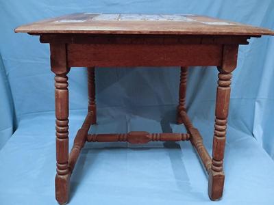 Sale Photo Thumbnail #3: Charming antique hand painted tiles of animals, buildings, trees in Medieval style. Wear corresponding to age. Nice golden color to wood. 22 1/2" W x 22 1/2" D x 22 1/2" H. Loose trim piece from underside included.