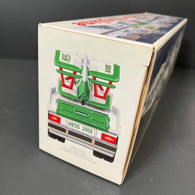 LOT 32: Collection of Hess Trucks and More