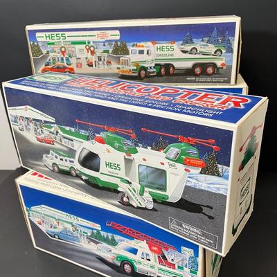 LOT 32: Collection of Hess Trucks and More