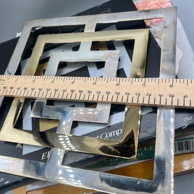 LOT 40 Collection of Trivets - Rogers Silverplate and More