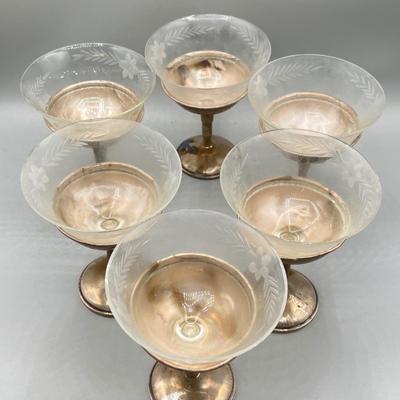 LOT 47: Set of Weighted Sterling Silver And Glass Dessert Glasses