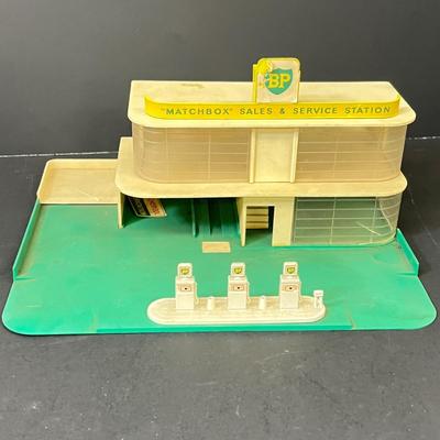LOT 66: Vintage Matchbox BP Service Station Playset and Racing Car Transporter Truck