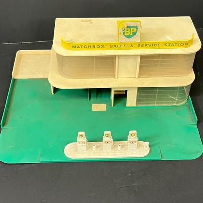 LOT 66: Vintage Matchbox BP Service Station Playset and Racing Car Transporter Truck
