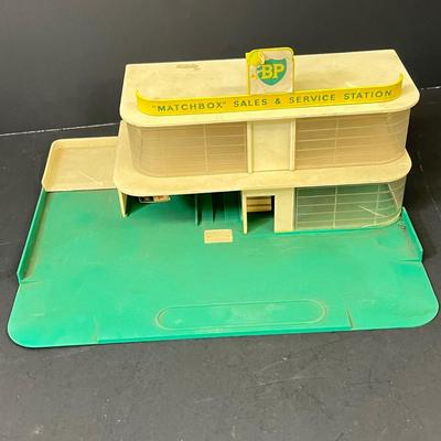 LOT 66: Vintage Matchbox BP Service Station Playset and Racing Car Transporter Truck