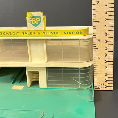 LOT 66: Vintage Matchbox BP Service Station Playset and Racing Car Transporter Truck