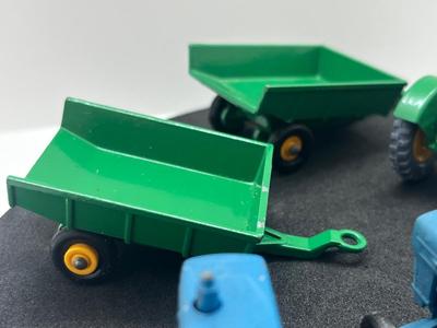 LOT 81: Vintage Lesney Matchbox Ford Tractors and More