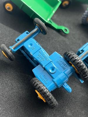 LOT 81: Vintage Lesney Matchbox Ford Tractors and More