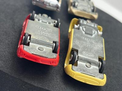 LOT 83: Vintage Aurora "Cigar Box" Cars - Ford "J", Dino Ferrrari, Lola GT and Ford XL 500