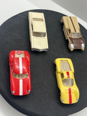 LOT 83: Vintage Aurora "Cigar Box" Cars - Ford "J", Dino Ferrrari, Lola GT and Ford XL 500