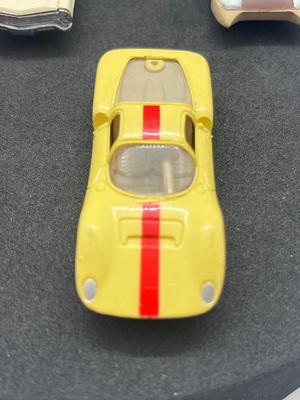 LOT 83: Vintage Aurora "Cigar Box" Cars - Ford "J", Dino Ferrrari, Lola GT and Ford XL 500