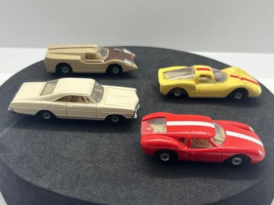 LOT 83: Vintage Aurora "Cigar Box" Cars - Ford "J", Dino Ferrrari, Lola GT and Ford XL 500