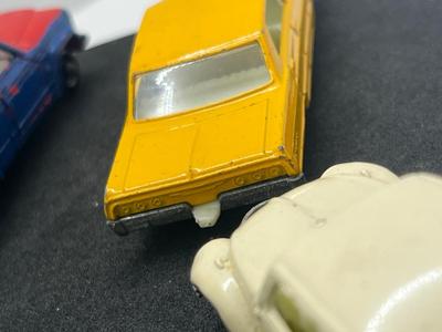 LOT 86: Vintage Lesney Matchbox - Chevrolet Impala Taxi, Volkswagon 1500 Saloon, Pickford Removal Van, Jeep Gladiator and Boat with Trailer