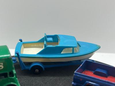 LOT 86: Vintage Lesney Matchbox - Chevrolet Impala Taxi, Volkswagon 1500 Saloon, Pickford Removal Van, Jeep Gladiator and Boat with Trailer
