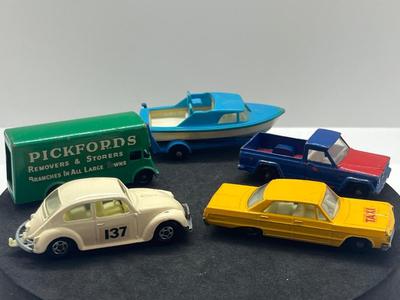 LOT 86: Vintage Lesney Matchbox - Chevrolet Impala Taxi, Volkswagon 1500 Saloon, Pickford Removal Van, Jeep Gladiator and Boat with Trailer