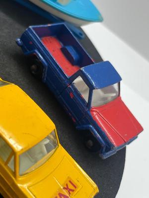LOT 86: Vintage Lesney Matchbox - Chevrolet Impala Taxi, Volkswagon 1500 Saloon, Pickford Removal Van, Jeep Gladiator and Boat with Trailer