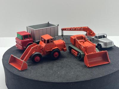 LOT 92: Vintage Lesney Matchbox Vehicles - GMC Tipper Truck, Tractor Shovel, Drott Excavator and Magirus -Deutz Crane Truck