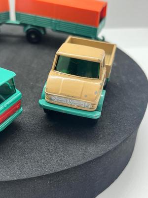 LOT 137: Vintage Lesney Matchbox Vehicles - "Unimog", Mercedes Trailer and More