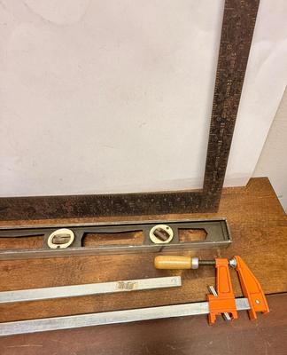 Sale Photo Thumbnail #41: Level and square have some rust, but are in solid, useable condition.  Jorgensen Clamps are 18" long and are in new condition.