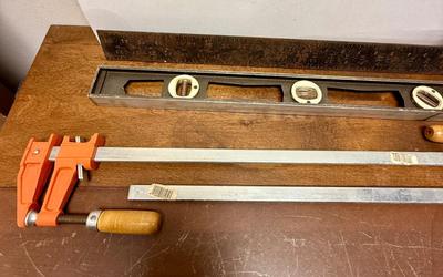Sale Photo Thumbnail #40: Level and square have some rust, but are in solid, useable condition.  Jorgensen Clamps are 18" long and are in new condition.