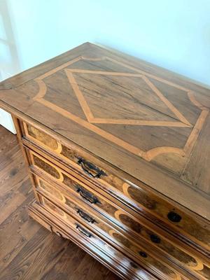 Sale Photo Thumbnail #5: Early 19th Century Italian Walnut Inlaid Oversized Chest of Drawers
64" x 27"x 43.5"
In great antique condition. Some wood "splitting" down each side and on top consistent with age not "damage".