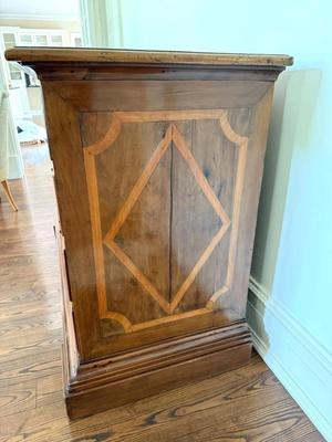 Sale Photo Thumbnail #4: Early 19th Century Italian Walnut Inlaid Oversized Chest of Drawers
64" x 27"x 43.5"
In great antique condition. Some wood "splitting" down each side and on top consistent with age not "damage".
