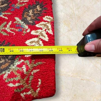 Sale Photo Thumbnail #1166: Red Runner Rug  approximately 92"x29" Brand-Laura Megroz 2009
Some staining on the back side.