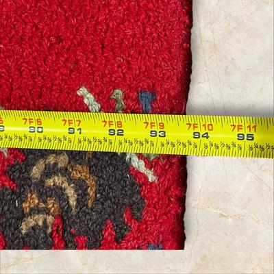 Sale Photo Thumbnail #1165: Red Runner Rug  approximately 92"x29" Brand-Laura Megroz 2009
Some staining on the back side.