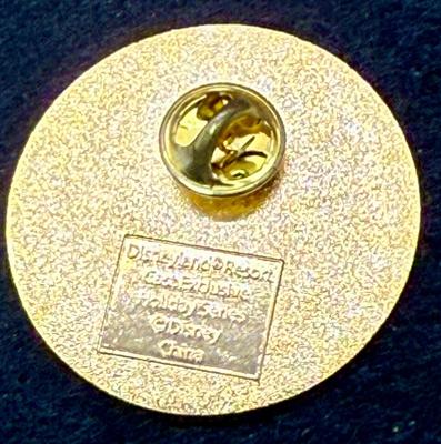 Sale Photo Thumbnail #451: Round pin with the Sleeping beauty Castle and an American flag. Great condition.