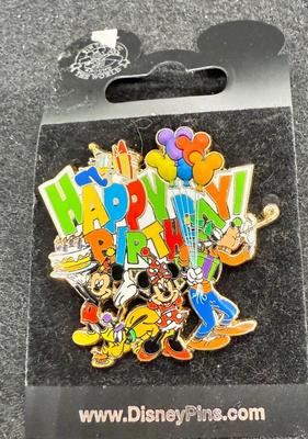 Sale Photo Thumbnail #452: Has the Fab 5: Mickey, Minnie, Goofy, Pluto and Donald on a colorful pin.  Great condition.