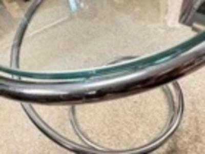 Sale Photo Thumbnail #254: Vintage 1970's Irving M Rosen Classic Pace Swirl Cigarette Accent Drink Table
13.5" x 14.5"
“In great vintage condition with minor marks on the chrome. Glass top could use a good cleaning. The small pieces that protrude to hold the glass in place have s